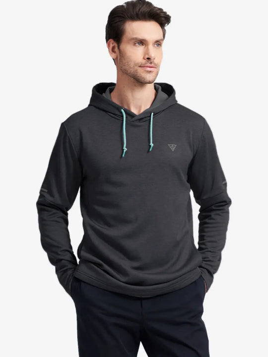 Model in half-body front pose styled with Dark Grey Heather hoodie, soft fleece fabric visible