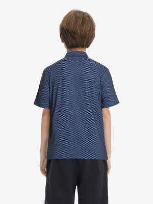 Back half-body view of youth wearing green seahorse performance print boys golf polo, showing rear design