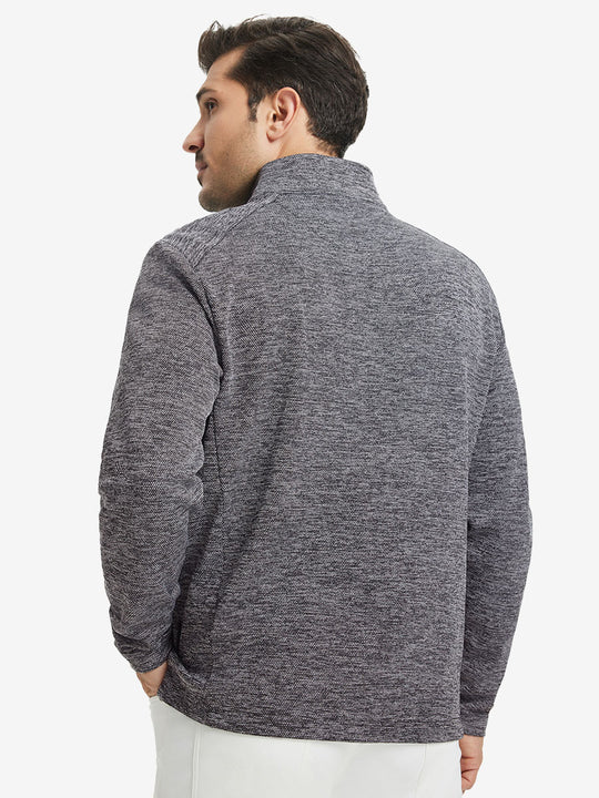Back upper body view of model wearing textured insulated winter jacket, smooth finish, black heather.