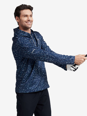 Model posing mid swing, wearing trendy print fleece hoodies with dynamic polka dots look