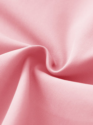 Close-up of fabric on water resistant versatile 8 pockets shorts, showing texture and finish in pink.